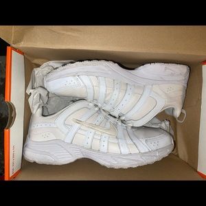 Nike advantage running shoes white in color/off-white.